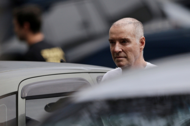 Ex-bilionário Eike Batista na Superintendência da PF no Rio de Janeiro Macaque in the trees