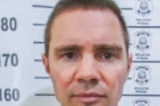 Vorcaro em foto da folha corrida policial